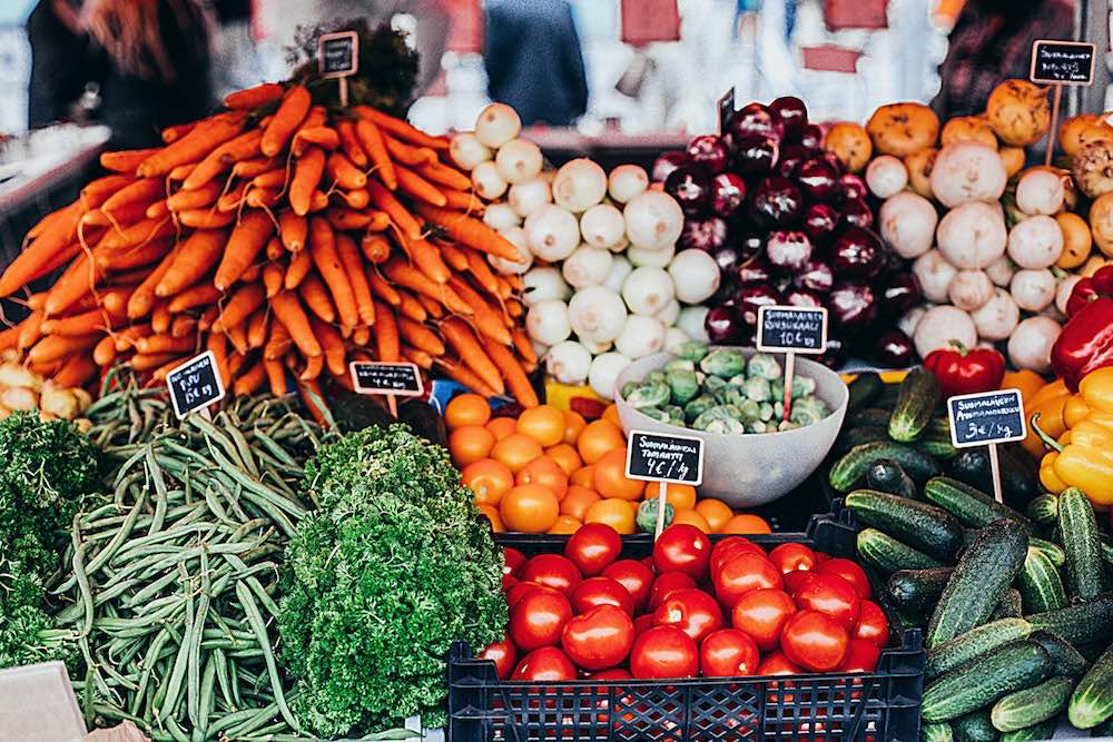 Whole foods, diverse vegetables at market